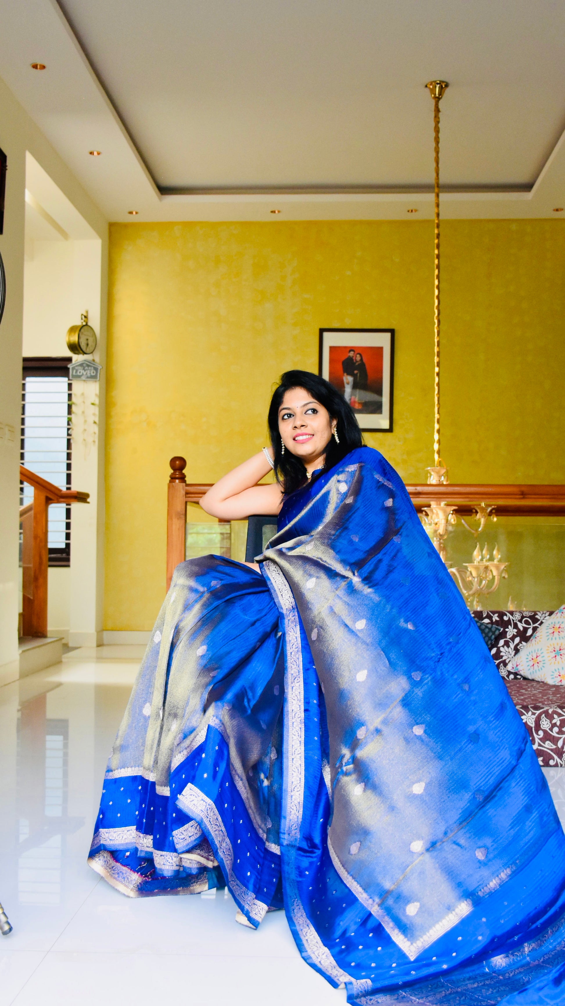 Royal blue Banarasi silk saree - model smiling portrait with pink blouse