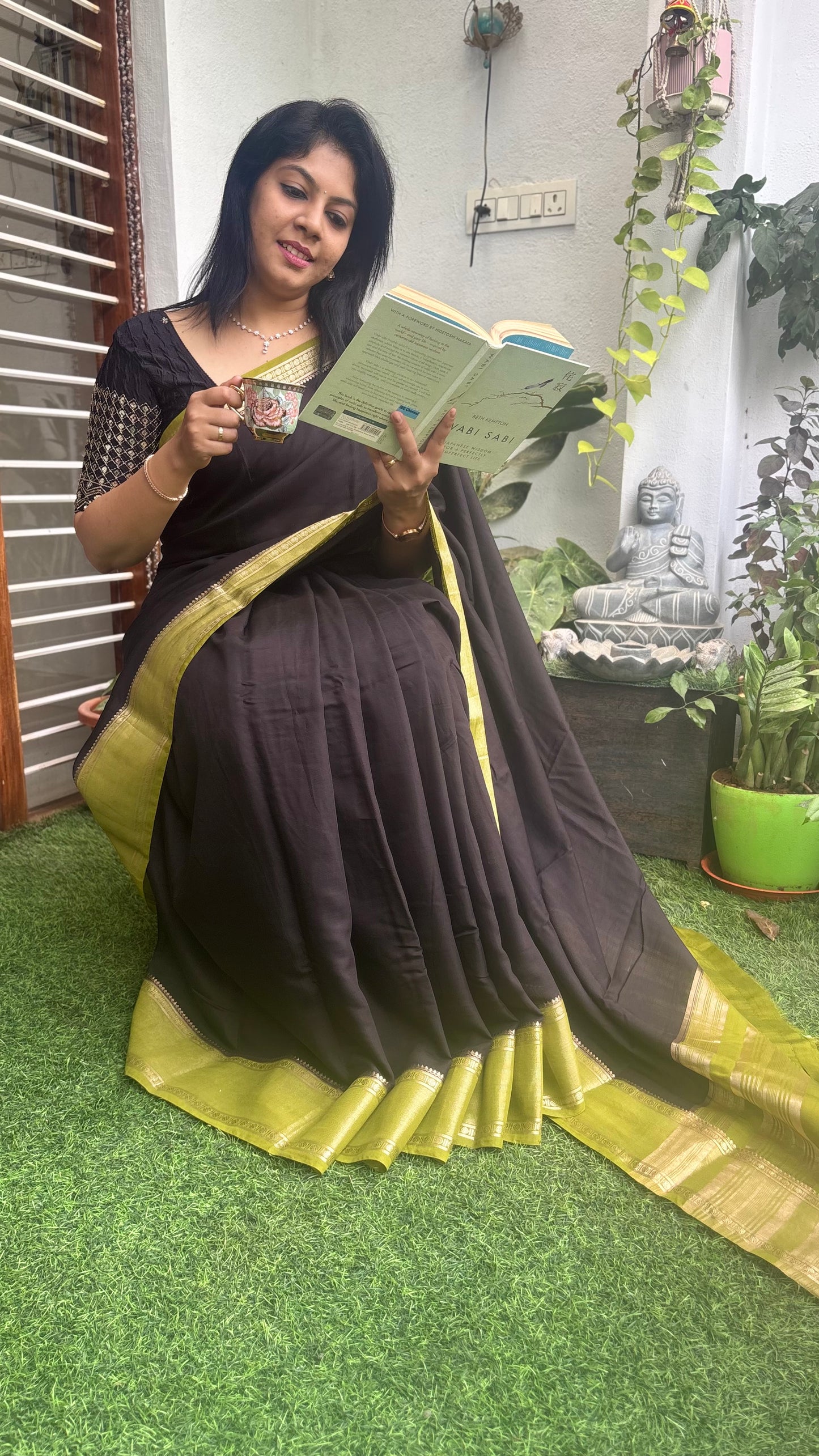 Black and green Assam silk saree - full drape standing view