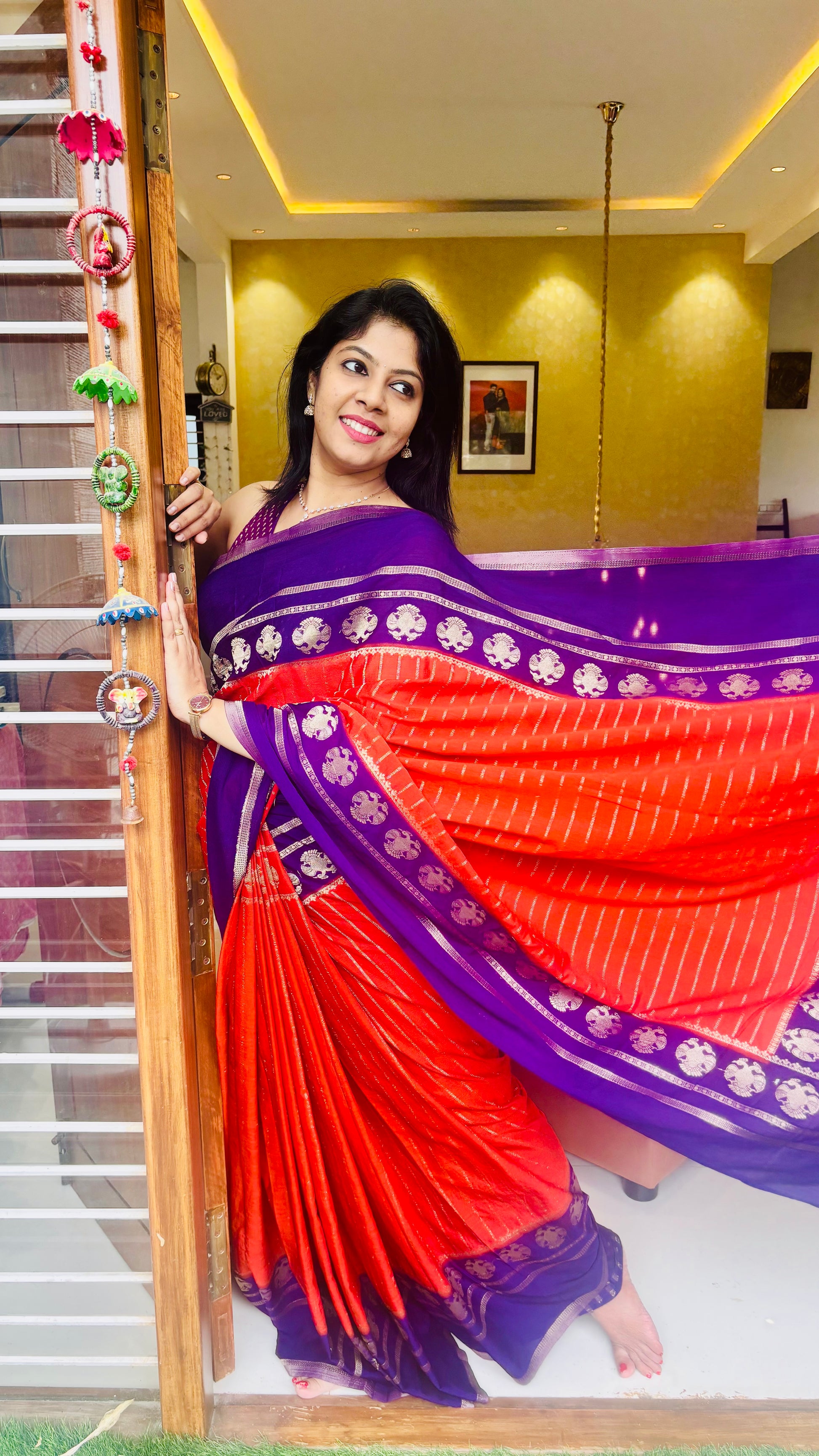 Khadi Georgette Saree Red Purple - Seated indoor pose