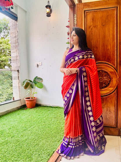 Khadi Georgette Saree Red Purple - Seated pose showing full drape