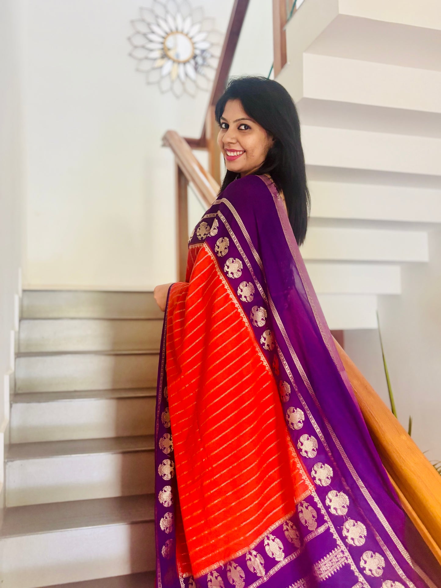 Khadi Georgette Saree Red Purple - Back view on staircase