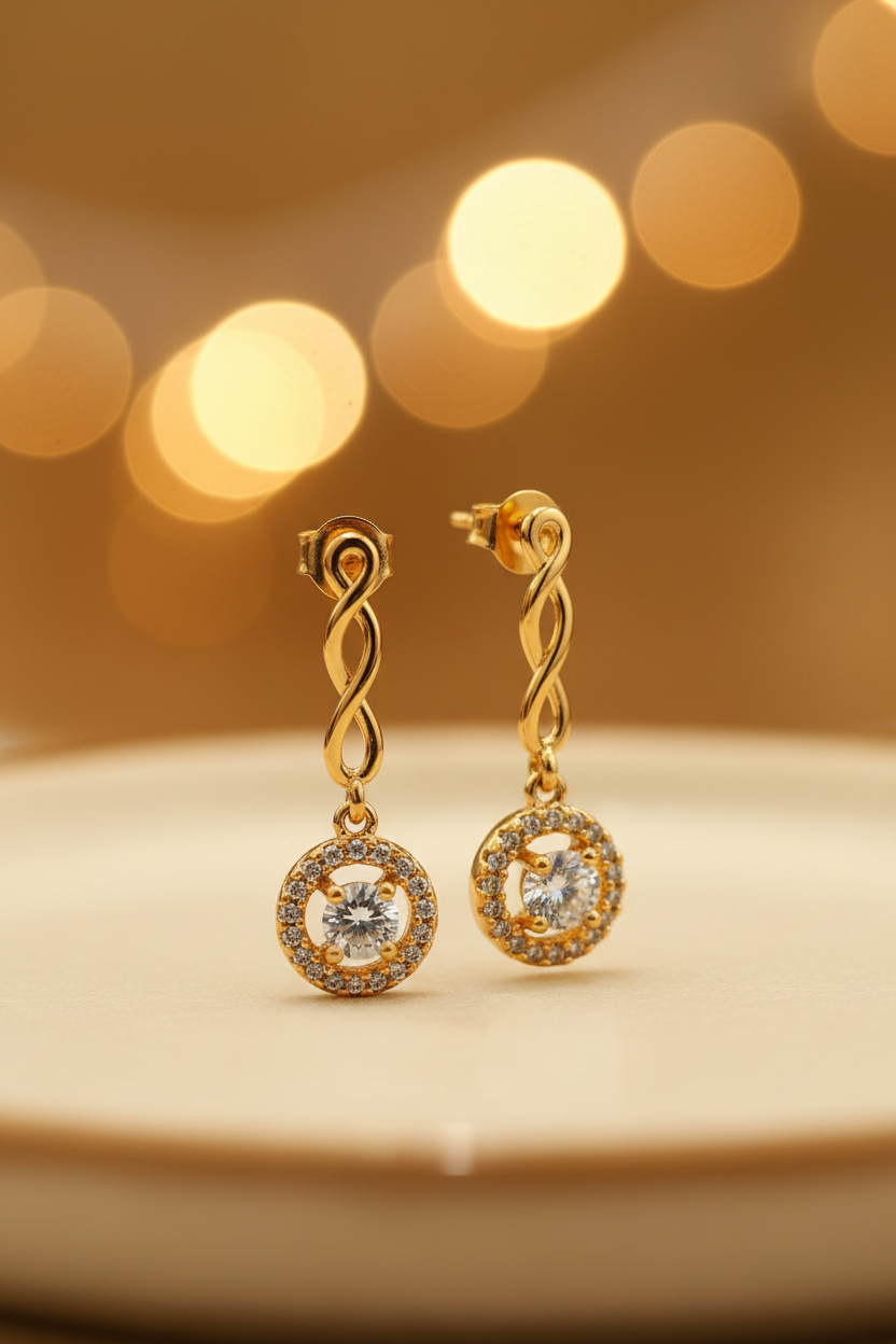 Gold Infinity Twist Bar Drop Earrings with Round CZ Solitaire - E-commerce Product Image
