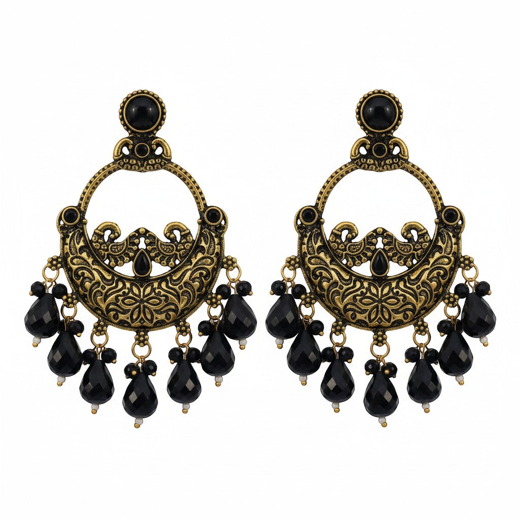 Naanu antique gold chandbali earrings with black stone drops and intricate floral engraving.