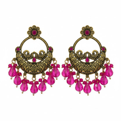 Naanu antique gold chandbali earrings with intricate peacock motifs, pink stones, and pink jade drops.