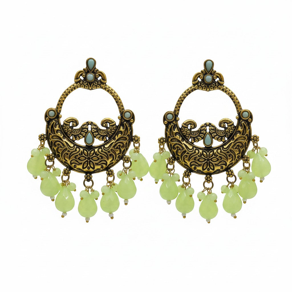 Naanu antique gold chandbali earrings with turquoise stones and lime green jade drops, featuring intricate peacock and floral engraving.
