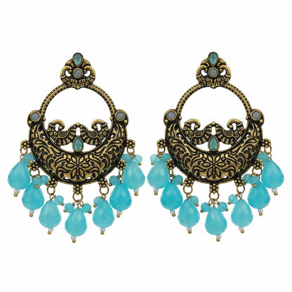 Naanu antique gold chandbali earrings with turquoise stones and lime green jade drops, featuring intricate peacock and floral engraving.