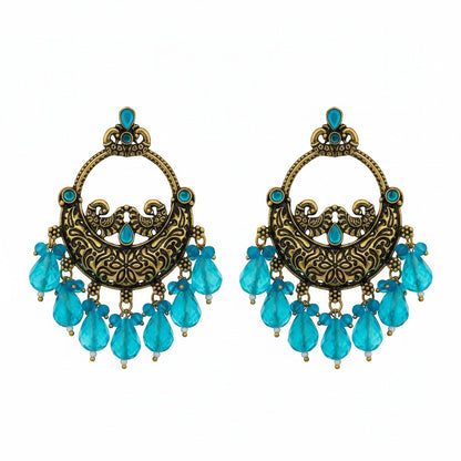 Naanu antique gold chandbali earrings with turquoise stones and lime green jade drops, featuring intricate peacock and floral engraving.