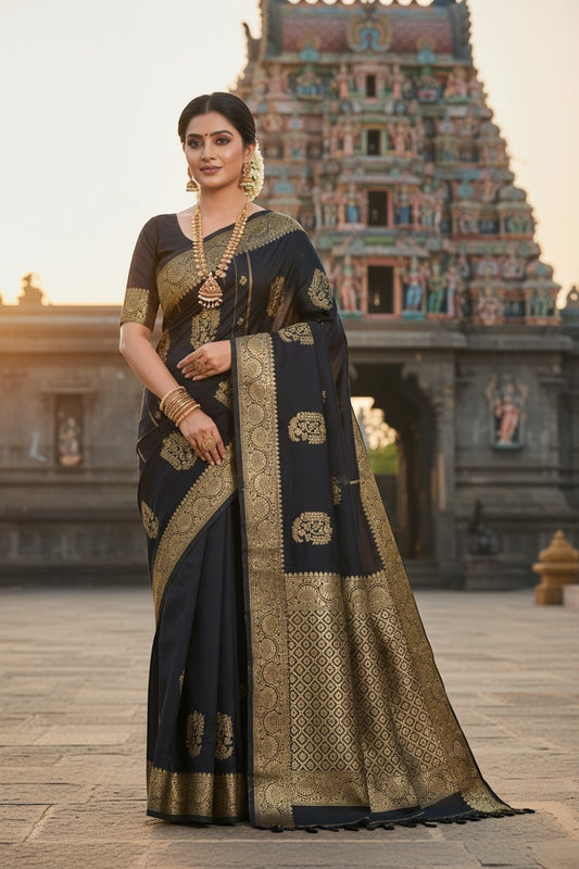 Naanu black crepe saree with antique gold medallion butta and geometric jaal pallu, broad gold border, worn by a model.