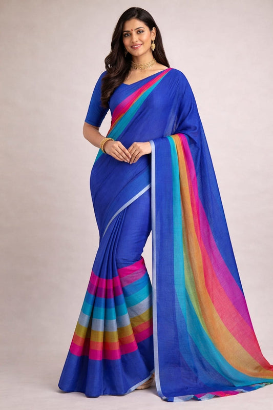 Naanu blue cotton saree with bold horizontal stripes in pink, orange, purple, and teal. Model wears a matching blue blouse.