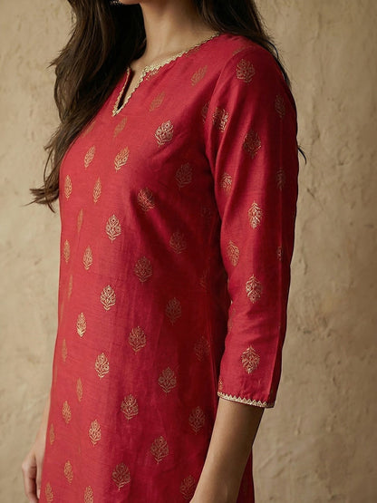 Naanu crimson silk blend straight kurta with gold foil butti print, notched V-neck, and gold lace trim.