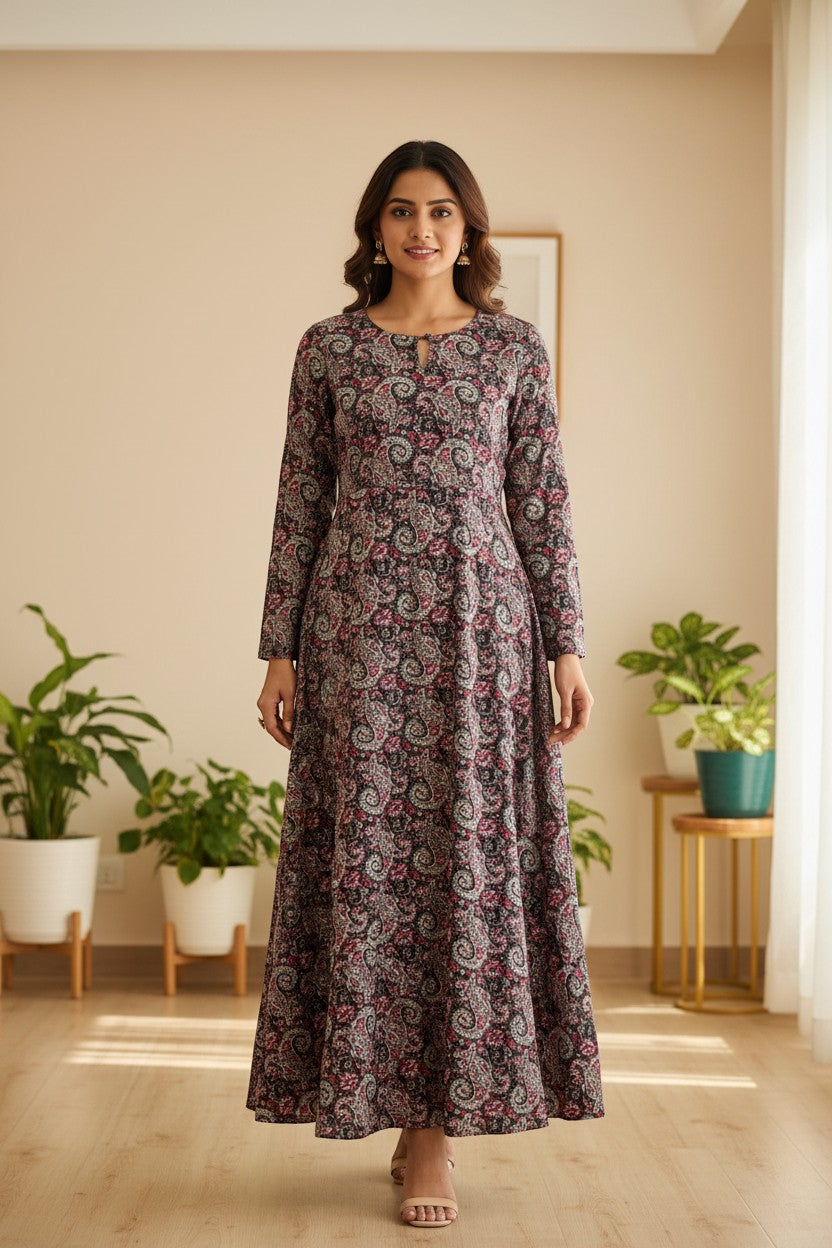 Naanu dark multicolor paisley print A-line maxi kurta with full sleeves and round keyhole neckline, made of pure cotton.