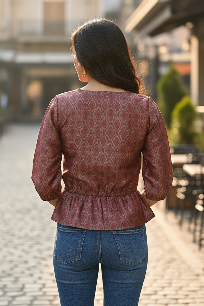 Naanu dusty mauve rose peplum top with geometric diamond jacquard weave, 3/4 sleeves, and ruched waistband.