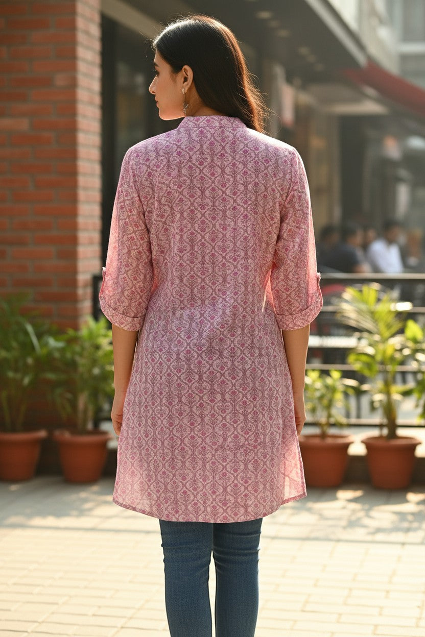 Naanu dusty pink georgette kurti with geometric diamond lattice print, mandarin collar, and 3/4 roll-up sleeves.