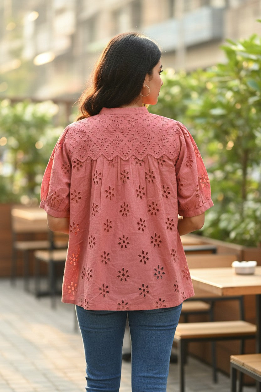 Naanu dusty rose pink cotton top with schiffli cutwork embroidery, mandarin collar, puff sleeves, and button front.