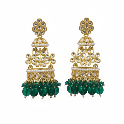 Naanu Emerald Green Tiered Kundan Jhumka Earrings with floral pearl detailing and green bead drops.