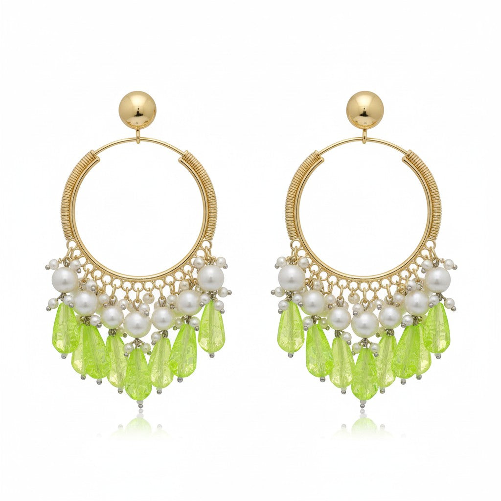 Naanu gold hoop earrings with pearl clusters and bright green crystal teardrop drops. Wire-wrapped hoop design.