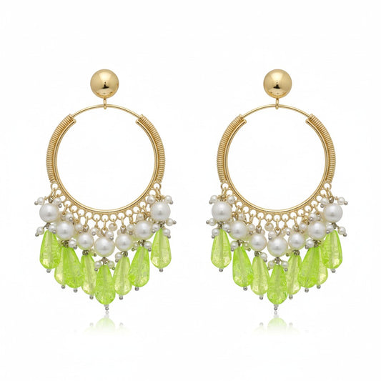 Naanu gold hoop earrings with pearl clusters and bright green crystal teardrop drops. Wire-wrapped hoop design.