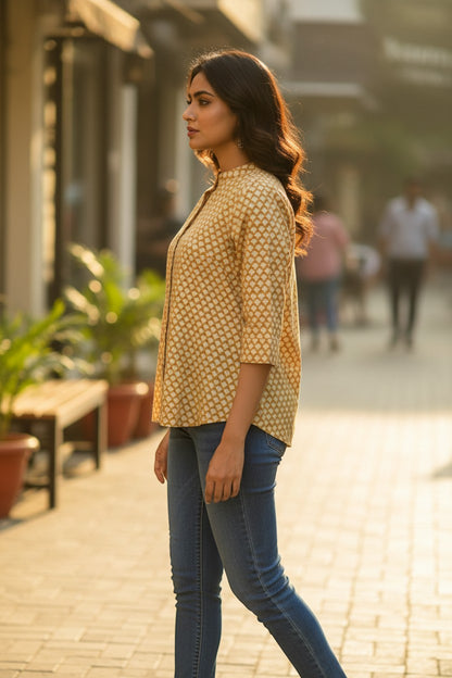Naanu golden yellow cotton short top with white scallop fan print, mandarin collar, and 3/4 sleeves.