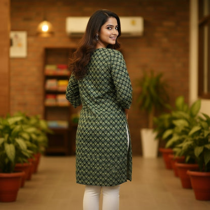 Naanu deep forest green cotton kurta with cream four-petal flower booti Dabu block print and 3/4 sleeves.