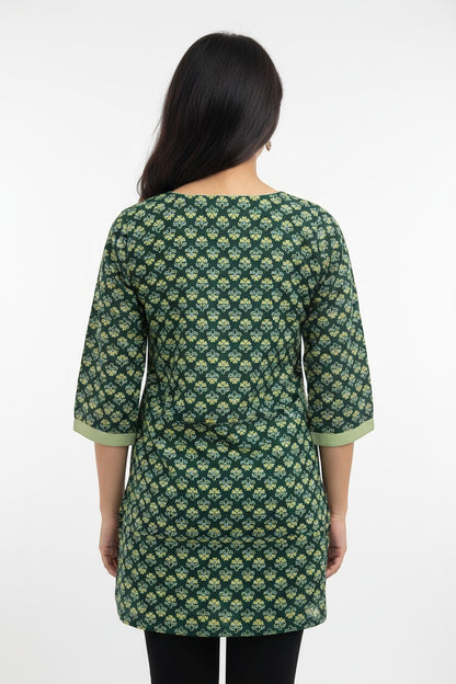 Naanu dark green cotton kurta with all-over white floral block print and contrast light green border on sleeves.
