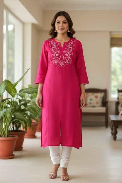 Naanu hot pink cotton kurta with white floral bird embroidery on V-yoke, 3/4 sleeves, and side slits.