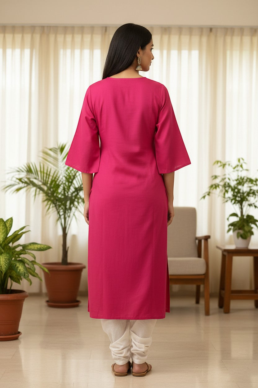 Naanu hot pink magenta cotton kurta with white floral bird embroidery on V-yoke and 3/4 bell sleeves.