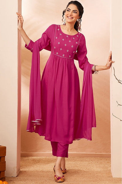 Naanu magenta Anarkali kurta set with white butti embroidery, lace trim, slim pants, and chiffon dupatta.