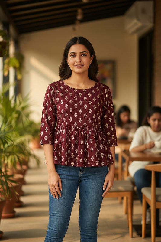 Naanu deep maroon burgundy georgette peplum top with white gold foil buti print and 3/4 sleeves.