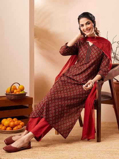 Naanu maroon cotton kurta with diamond print, keyhole neckline, embroidered placket, 3/4 sleeves, straight pants, and crimson chiffon dupatta.