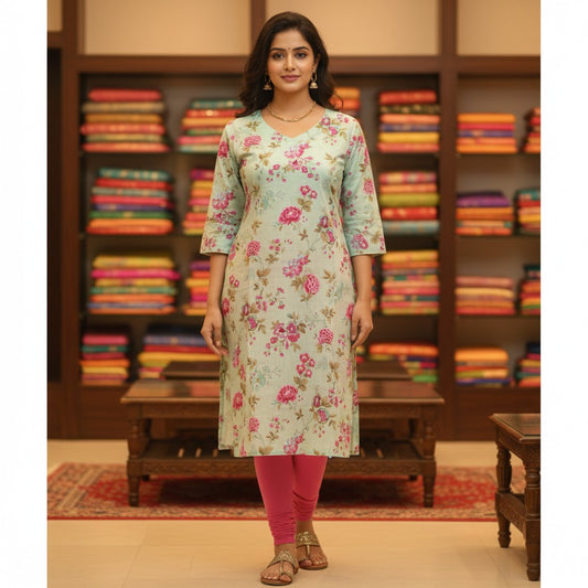 Naanu mint aqua cotton kurta with large pink and magenta peony floral print, V-neck, 3/4 sleeves, and front pockets.