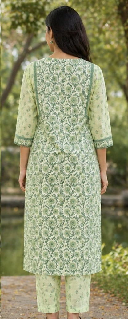 Naanu mint green cotton kurta set with circular jaal block print, V-neck, 3/4 bell sleeves, and straight pants.
