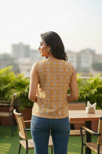 Naanu mustard yellow cotton sleeveless top with white geometric lattice floral block print. Round scoop neck.