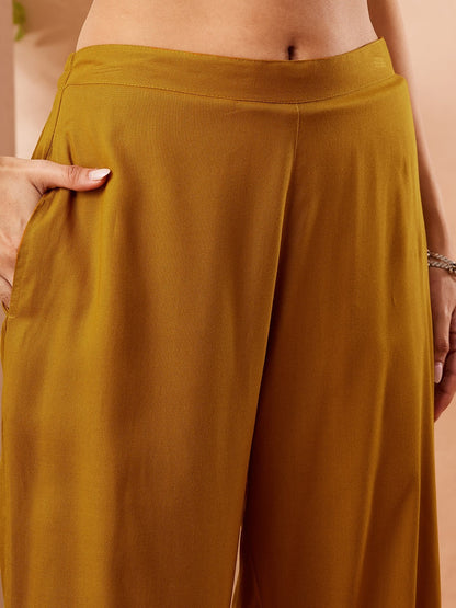 Naanu mustard yellow solid straight kurta palazzo and paisley dupatta set. Wide-leg palazzo pants with pockets.