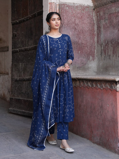 Naanu navy blue cotton-blend 3-piece Anarkali kurta set with white bandhani dots, lace trim, pearl buttons, slim pants, and dupatta.