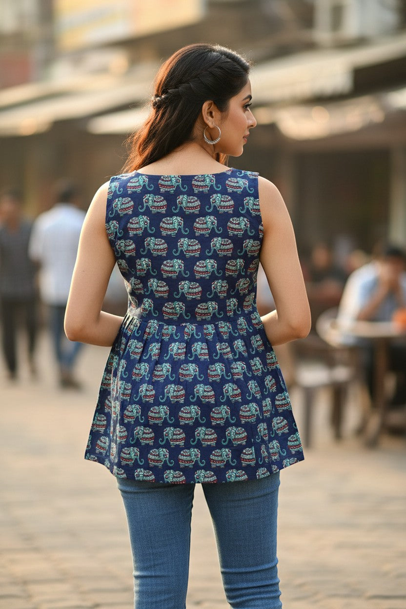 Naanu navy blue sleeveless cotton tunic with decorative elephant print in teal, red, and white. Square neck, straight fit.