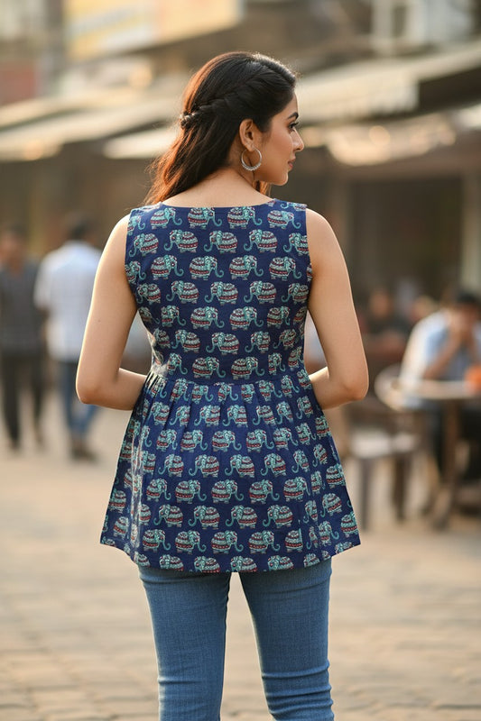 Naanu navy blue sleeveless cotton tunic with decorative elephant print in teal, red, and white. Square neck, straight fit.