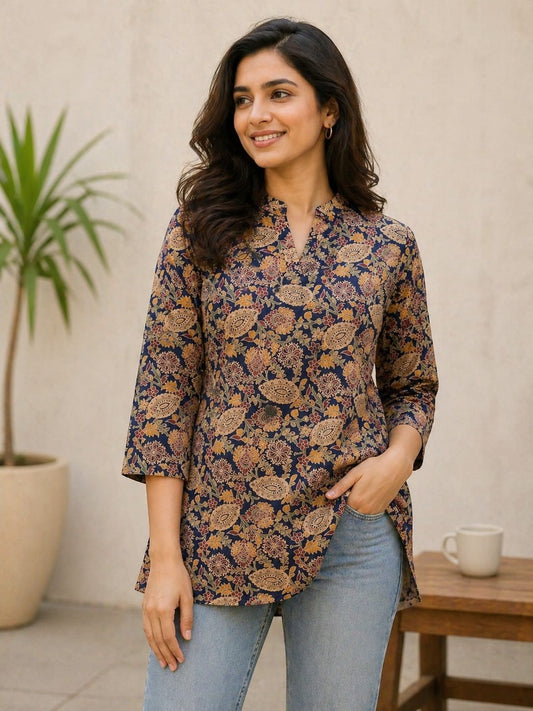Naanu navy blue cotton kurti with gold paisley and floral jaal print, V-neck, and 3/4 sleeves.