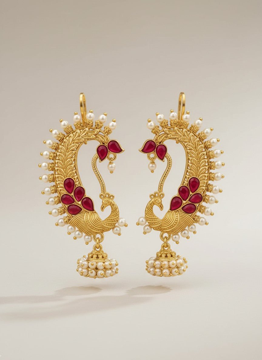 Naanu gold peacock chand bali earrings with ruby kemp stones and pearl jhumka drops.