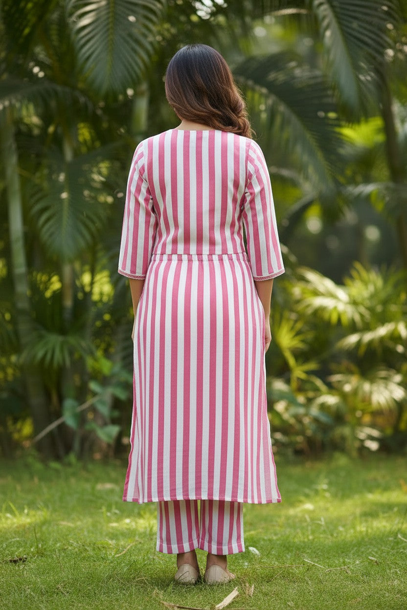 Naanu pink and white vertical stripe straight kurta with 3/4 sleeves and matching pants. Lightweight fabric, ideal for summer.
