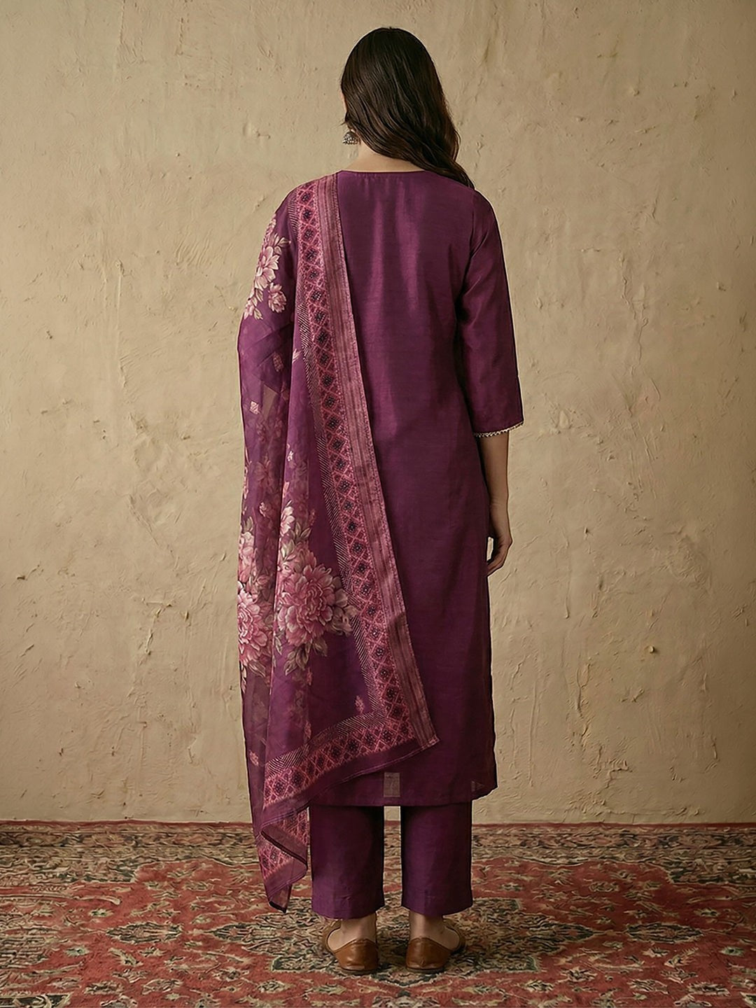 Naanu plum silk blend straight kurta set with 3/4 sleeves and floral organza dupatta. Features silver lace trim.