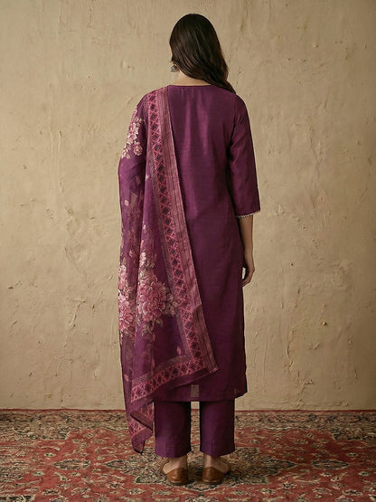 Naanu plum silk blend straight kurta set with 3/4 sleeves and floral organza dupatta. Features silver lace trim.