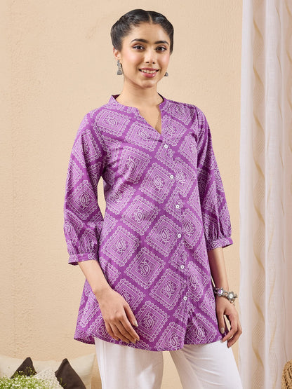 Naanu purple cotton tunic with white bandhani paisley print, mandarin collar, puff sleeves, and button-down front.