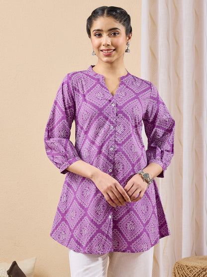 Naanu purple cotton tunic with white bandhani paisley print, mandarin collar, button-down front, and puff sleeves.
