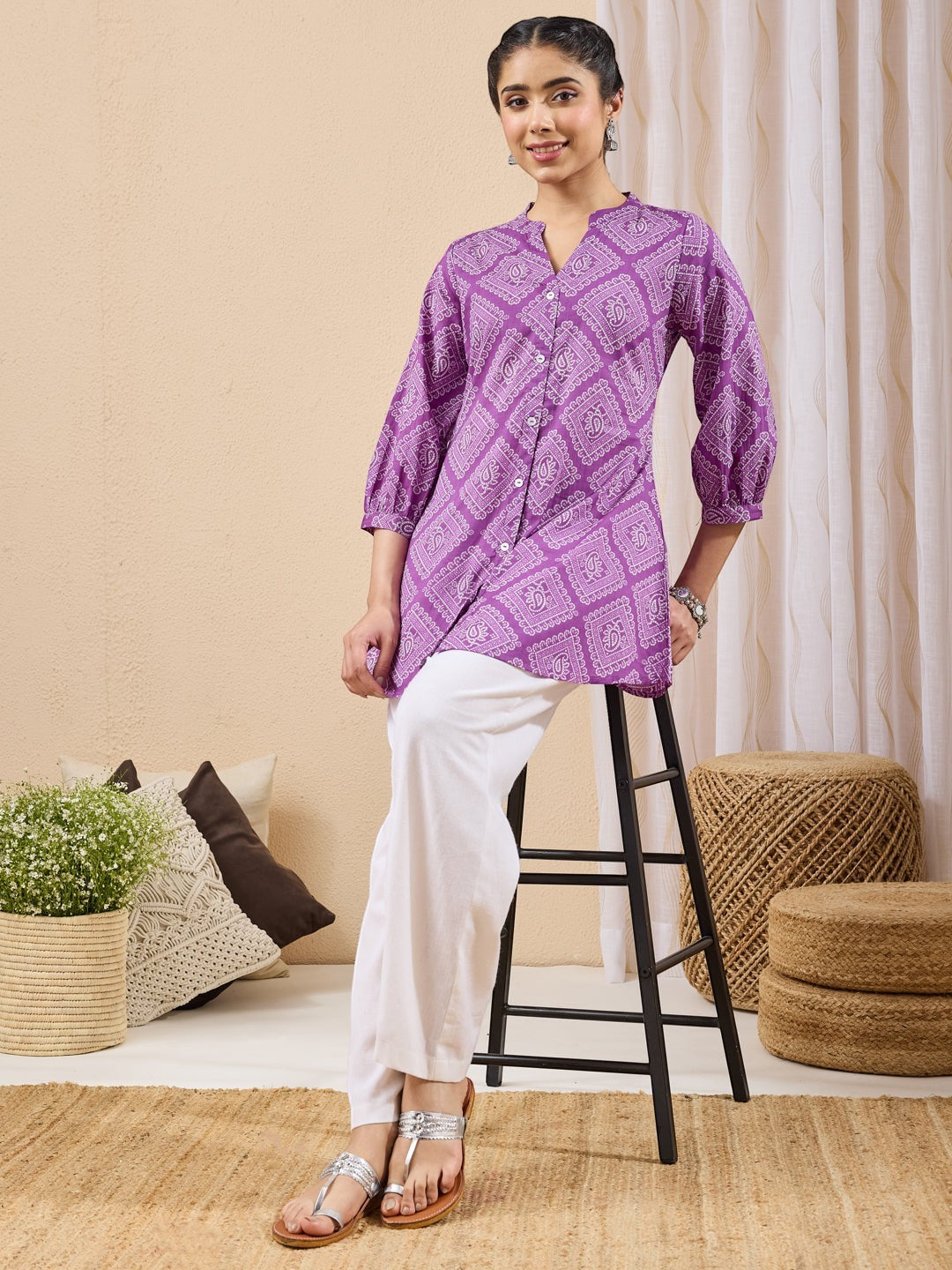 Naanu purple cotton tunic with bandhani paisley print, puff sleeves, and button-down front.