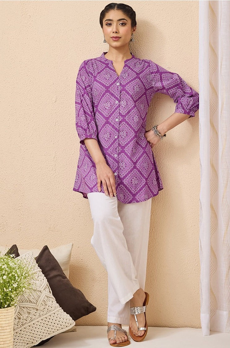 Naanu purple cotton tunic with bandhani paisley print, puff sleeves, and button-down front.