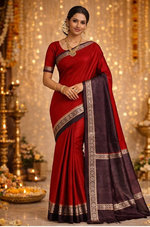 Naanu red Chanderi silk saree with a dark contrast border and gold motifs. Model wears gold jewelry.