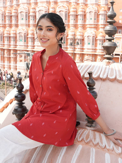 Naanu red cotton tunic with tonal butti print, Mandarin collar, button-down front, and 3/4 sleeves.