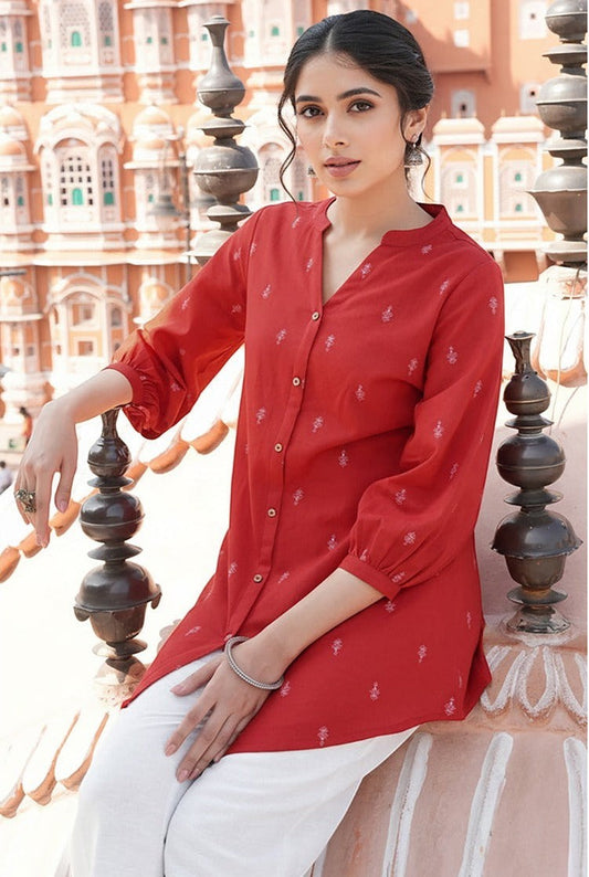 Naanu red cotton tunic with tonal butti print, Mandarin collar, button-down front, and 3/4 sleeves.