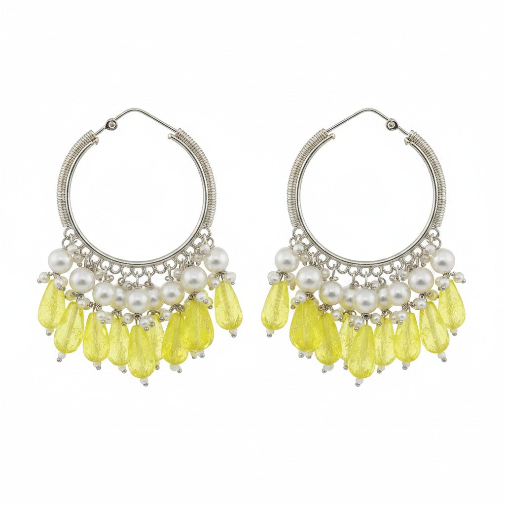 Naanu silver hoop earrings with pearl clusters and yellow crystal teardrop drops.