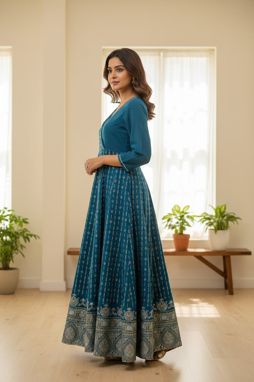 Naanu teal peacock blue cotton A-line maxi kurta with gold geometric stripes and floral border, 3/4 sleeves, V-neck.